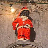 Писающий Мальчик оденется в костюм Санта-Клауса
