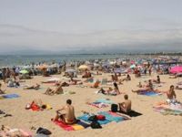 "Дешевый" загар на зимних пляжах Испании